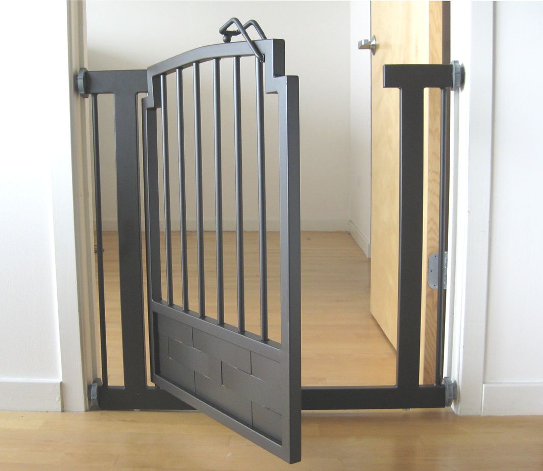 Pressure mounted dog gate showing weave pattern sheet metal